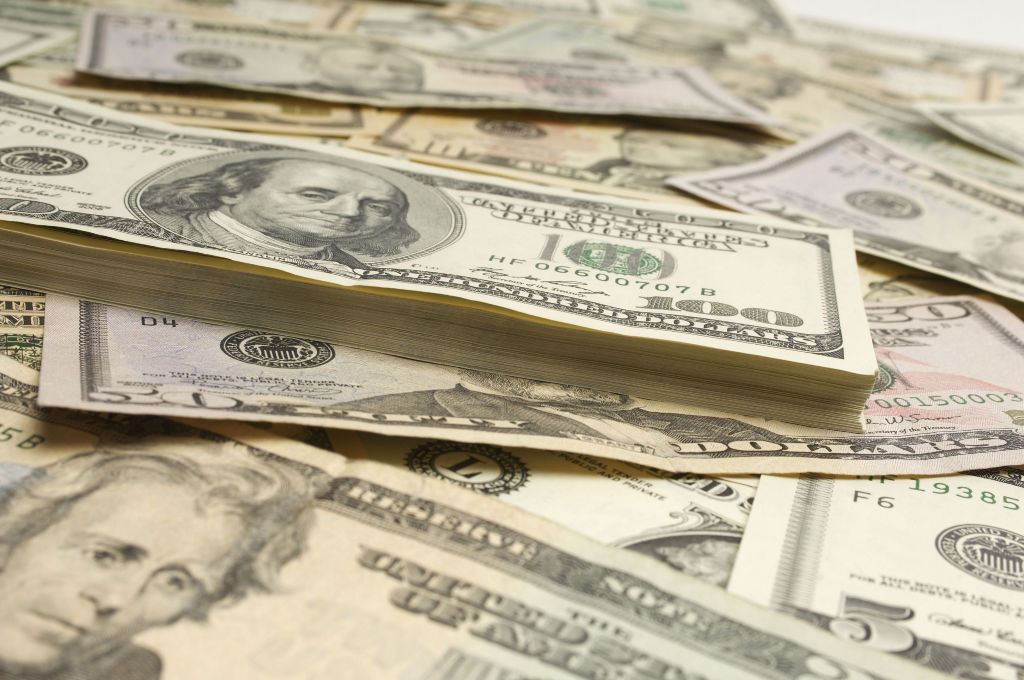 Destruction by the dollar, not of the dollar